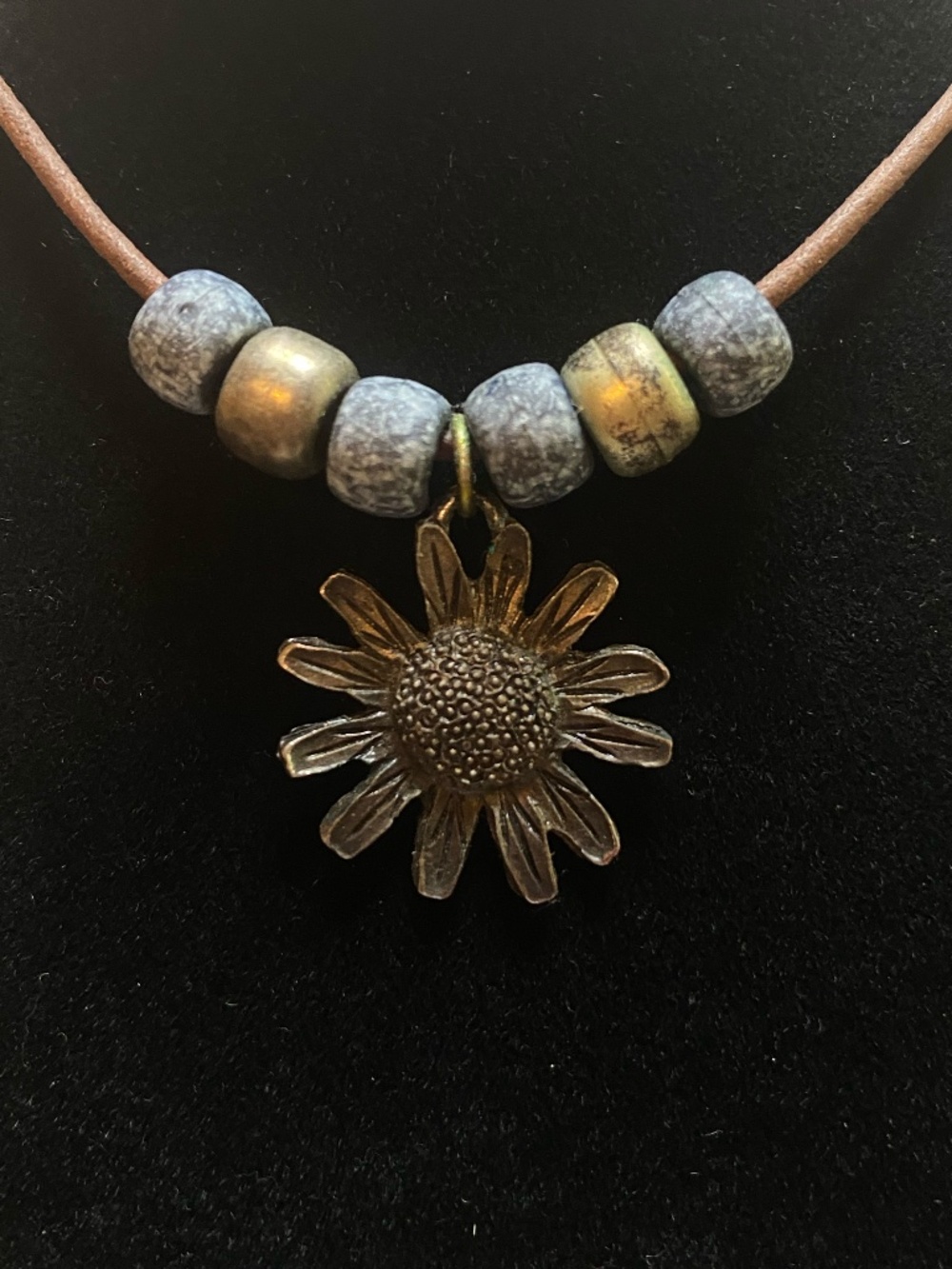 Pewter sunflower and leather necklace
